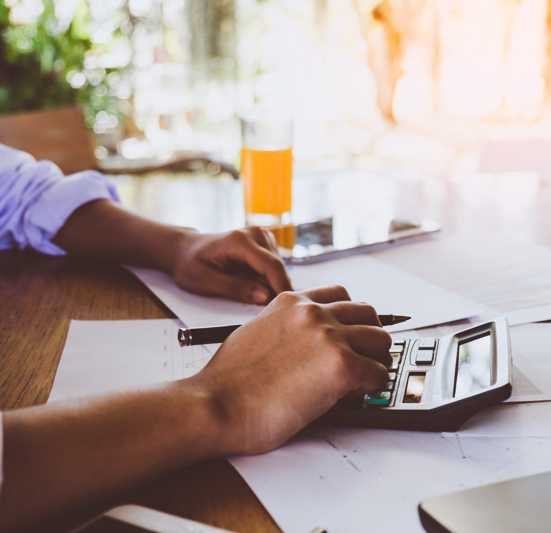 business woman analyzing investment charts morning time min scaled e1760201262913